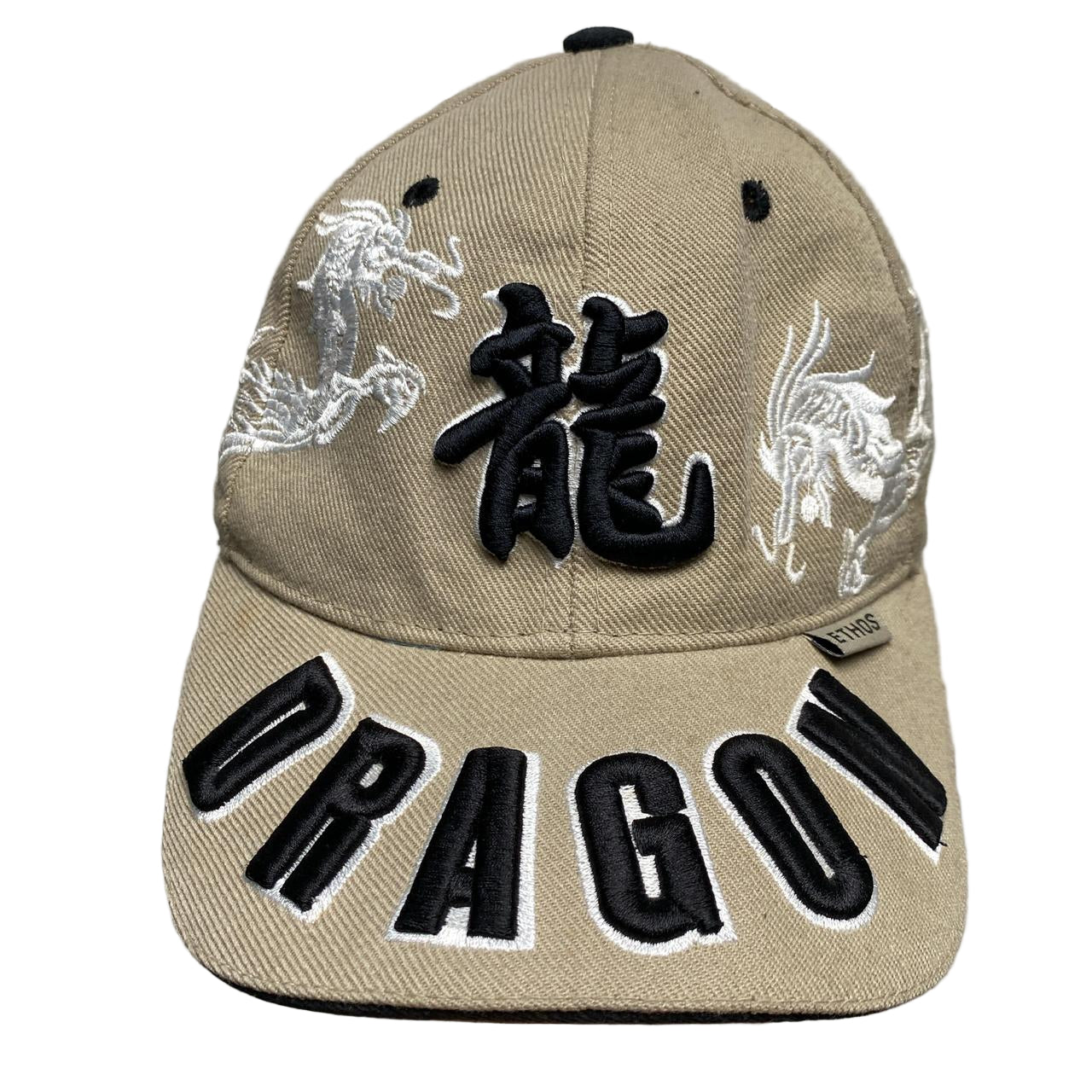 Dragon Ethos Cream and Black Cap