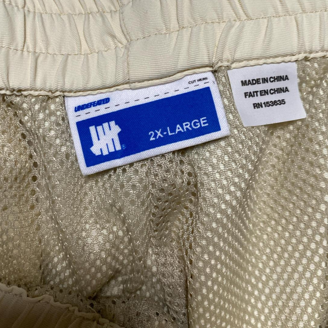 Undefeated Cream Mesh Pocket Shorts (2XL)
