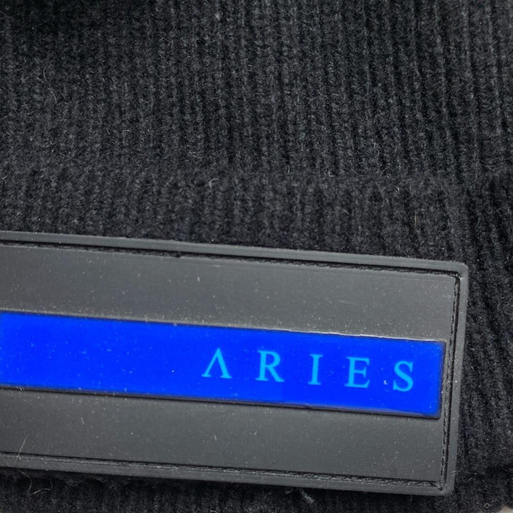 Aries Rubber Patch Black and Blue Strip Beanie Hat