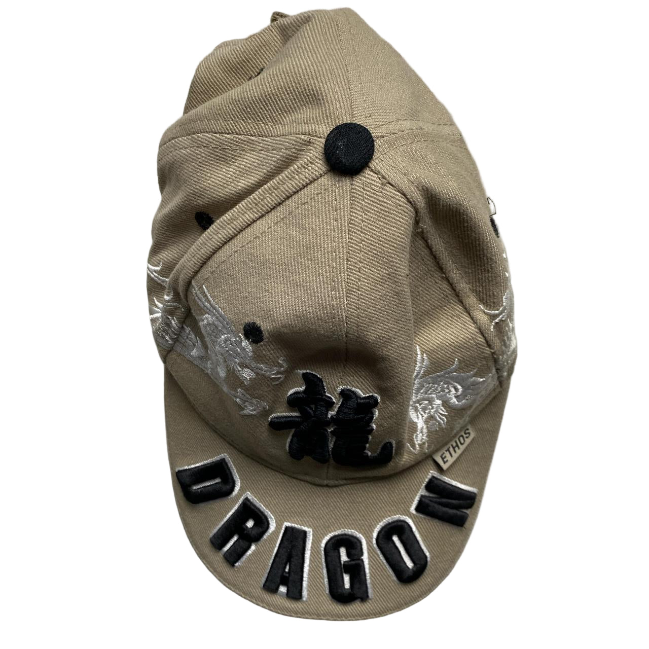 Dragon Ethos Cream and Black Cap