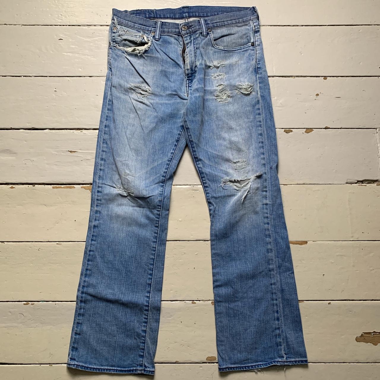 Levis 527 Distressed Light Blue Jeans