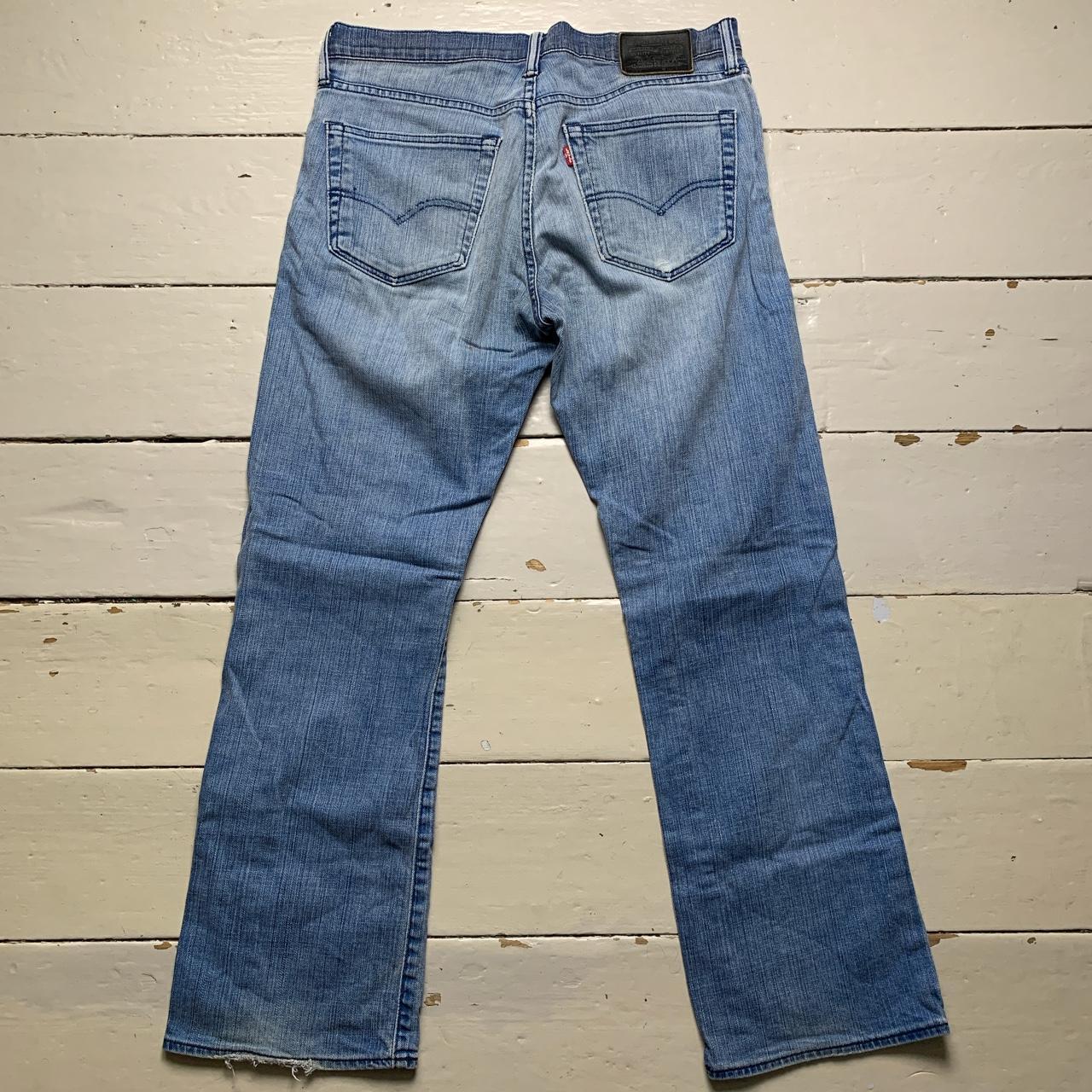 Levis 527 Distressed Light Blue Jeans
