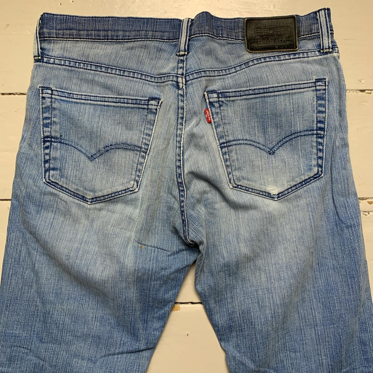 Levis 527 Distressed Light Blue Jeans