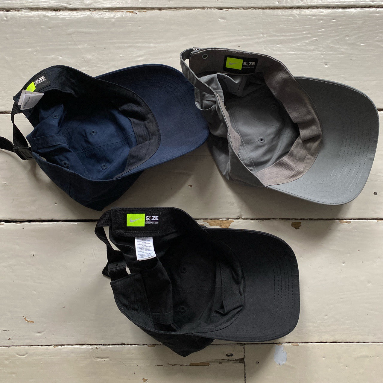 Nike Silver Plaque Swoosh Caps