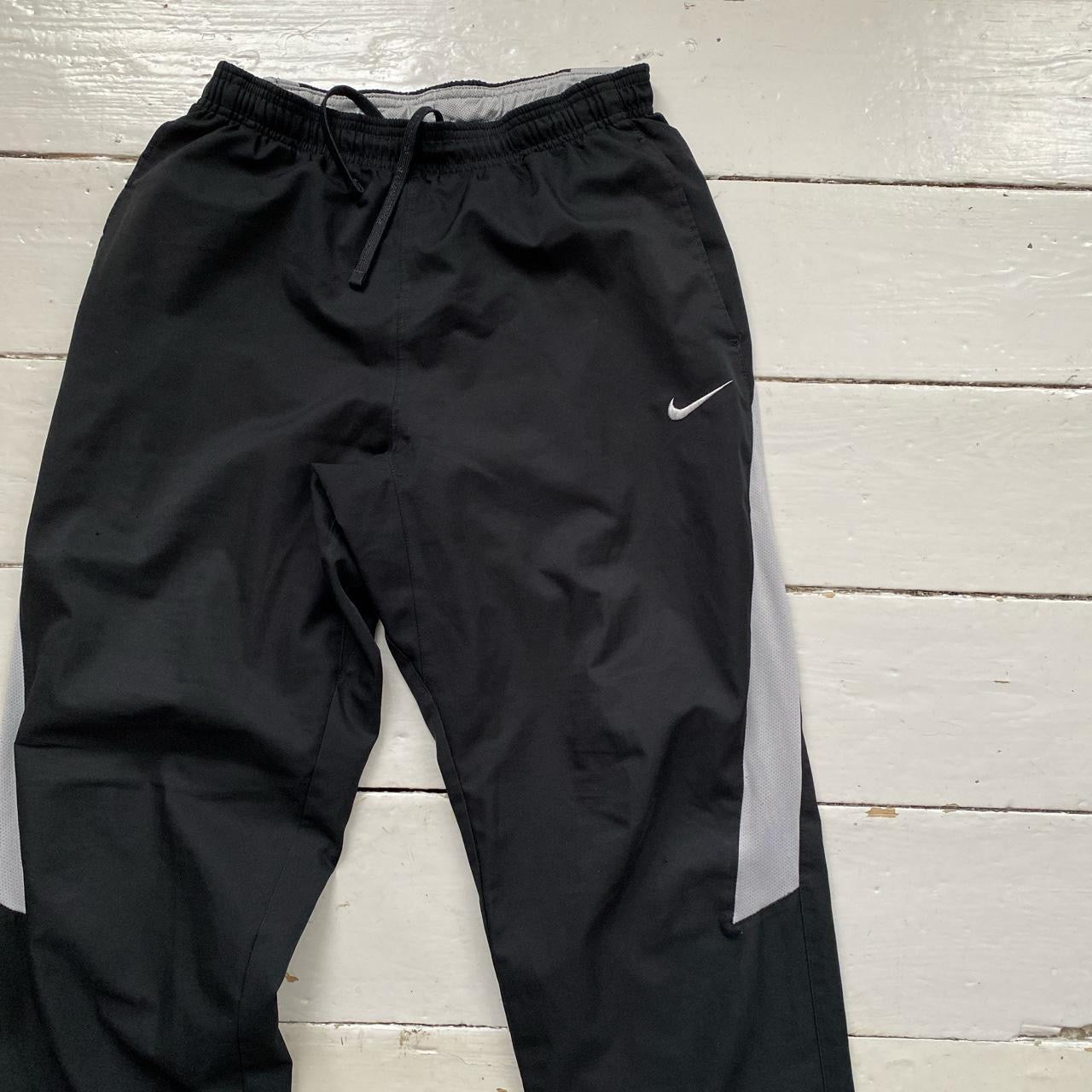 Nike Swoosh Black Shell Bottoms (Small)