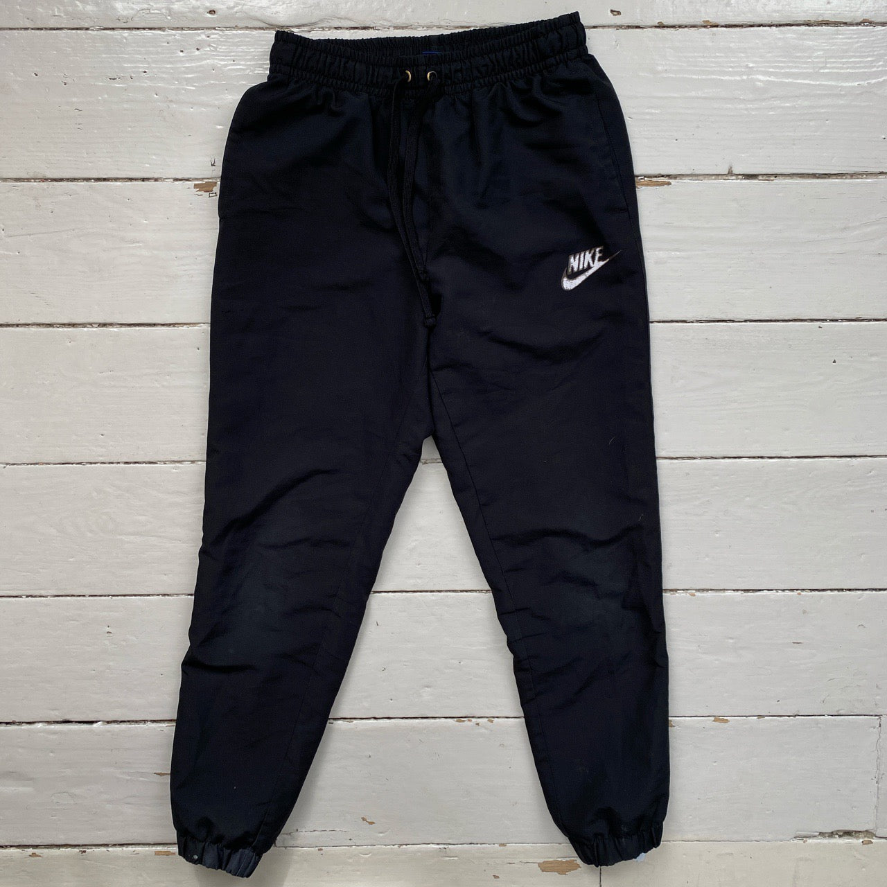 Nike White Swoosh Shell Bottoms (Small)