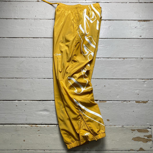 Corteiz Yellow Shell Shuku Trackpant Bottoms