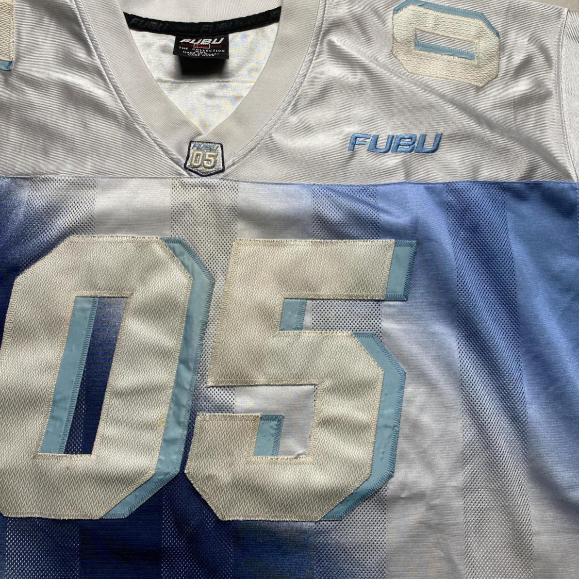 FUBU Vintage 90’s Light Blue Ombre Navy Blend White NFL Football Jersey (2XL)