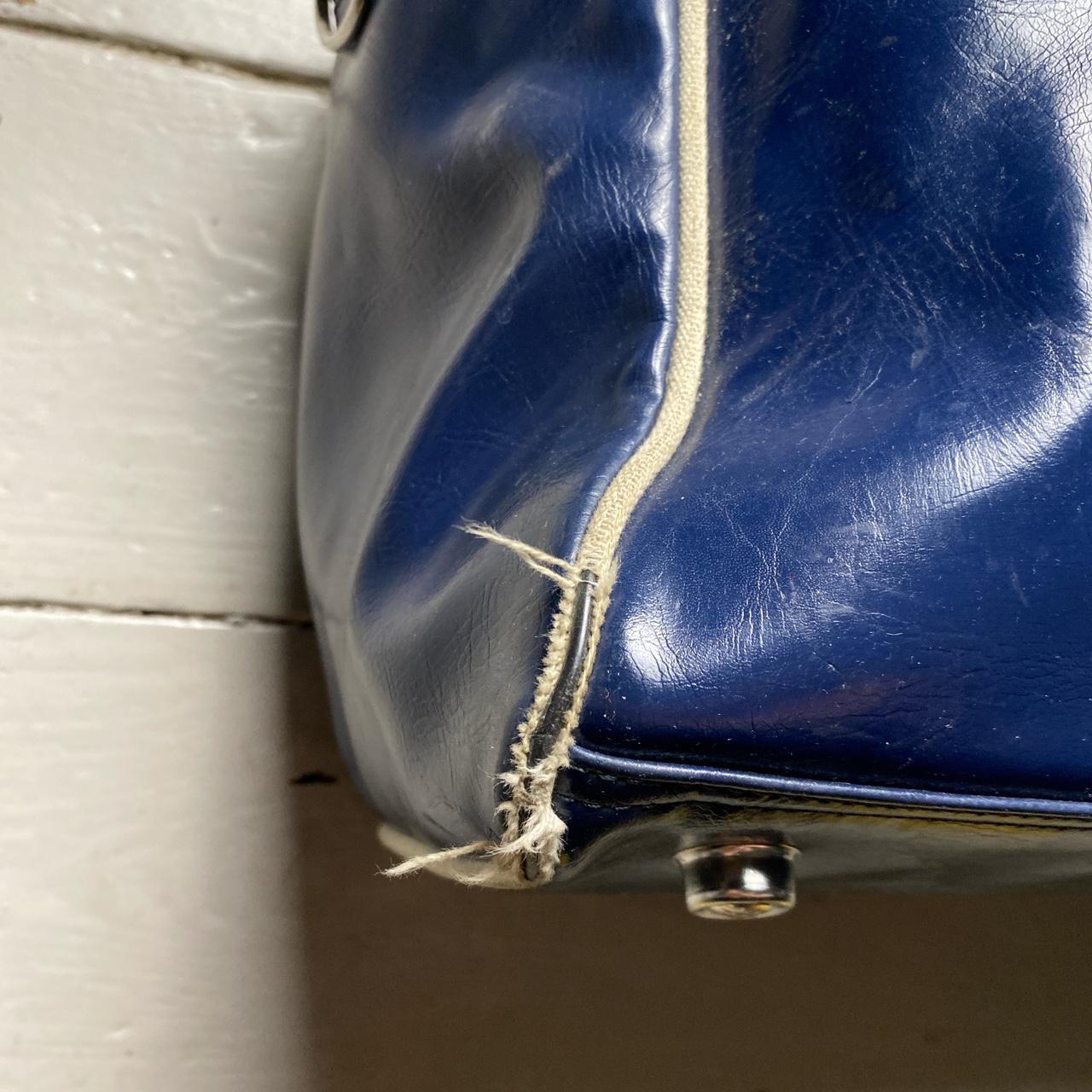 Navy and white Fred Perry leather weekend bag leather