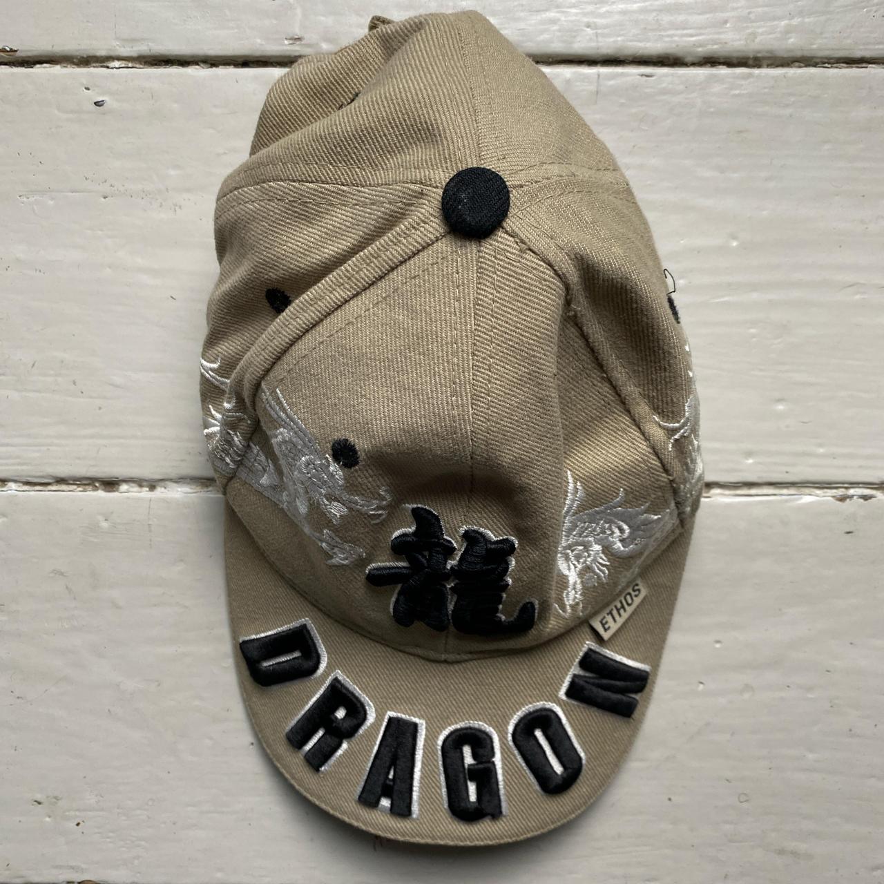 Dragon Ethos Cream and Black Cap