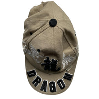 Dragon Ethos Cream and Black Cap