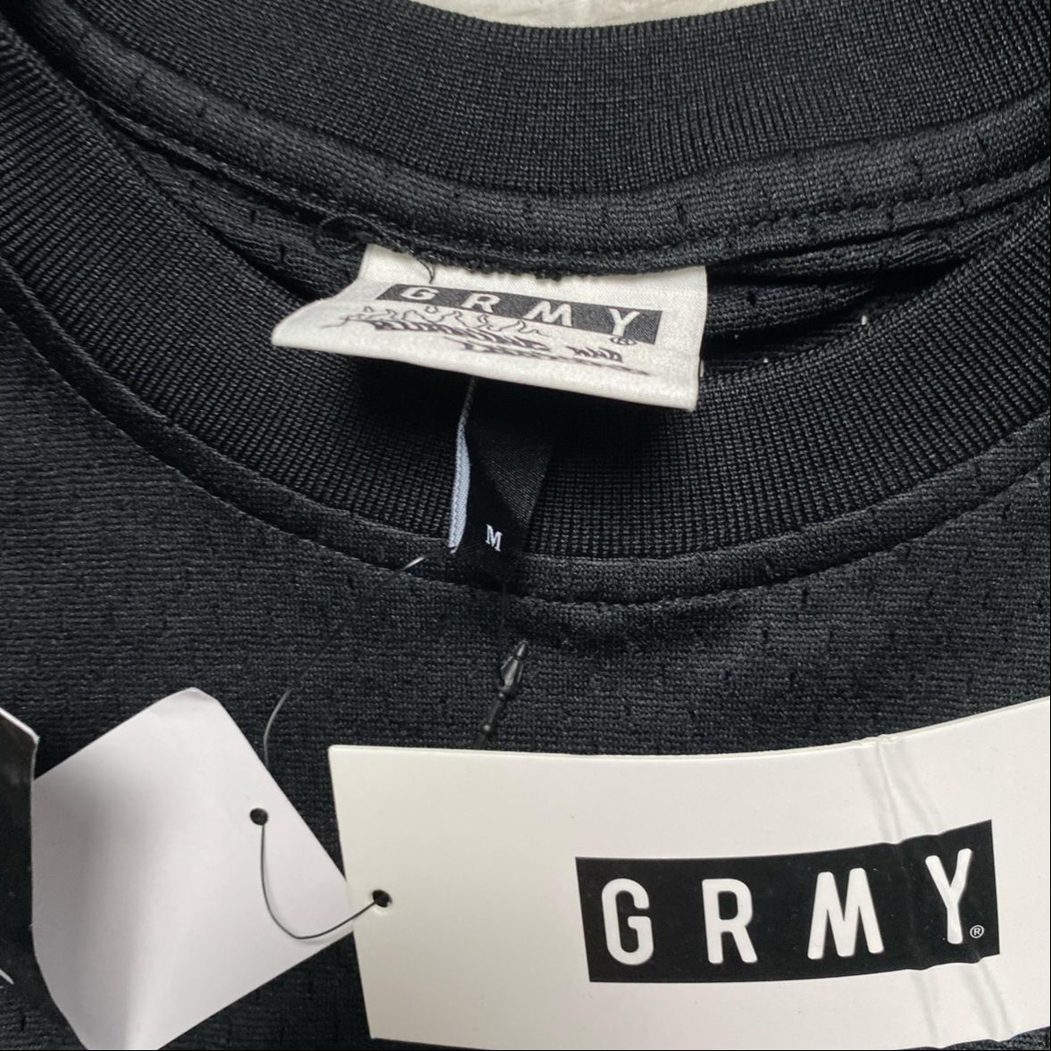 Grimey Black and Green Clovers Long Sleeve Football Jersey (M)