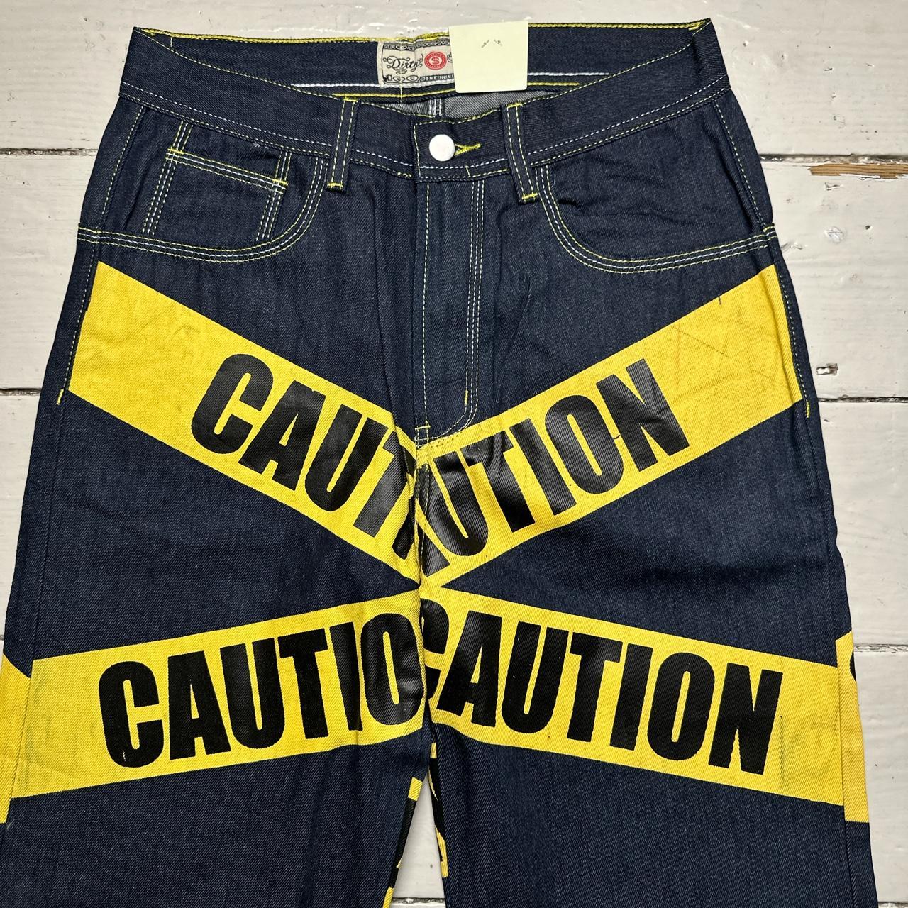 Dirty Money Vintage Caution Print Jeans