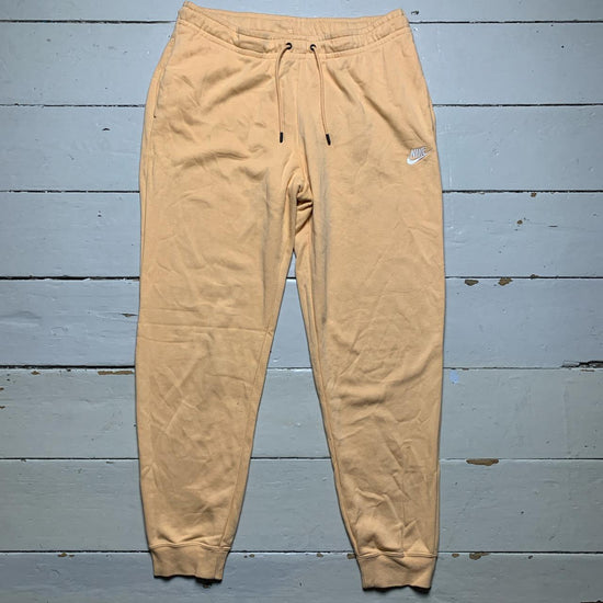 Nike Peach and White Swoosh joggers