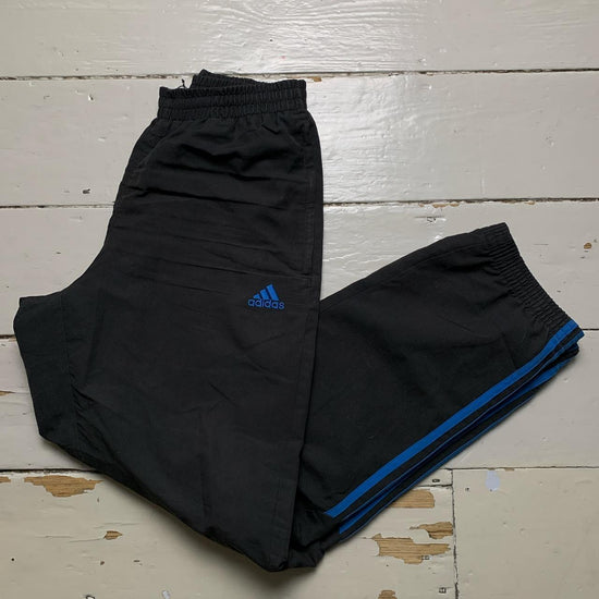 Adidas Black and Blue Baggy Shell Bottoms