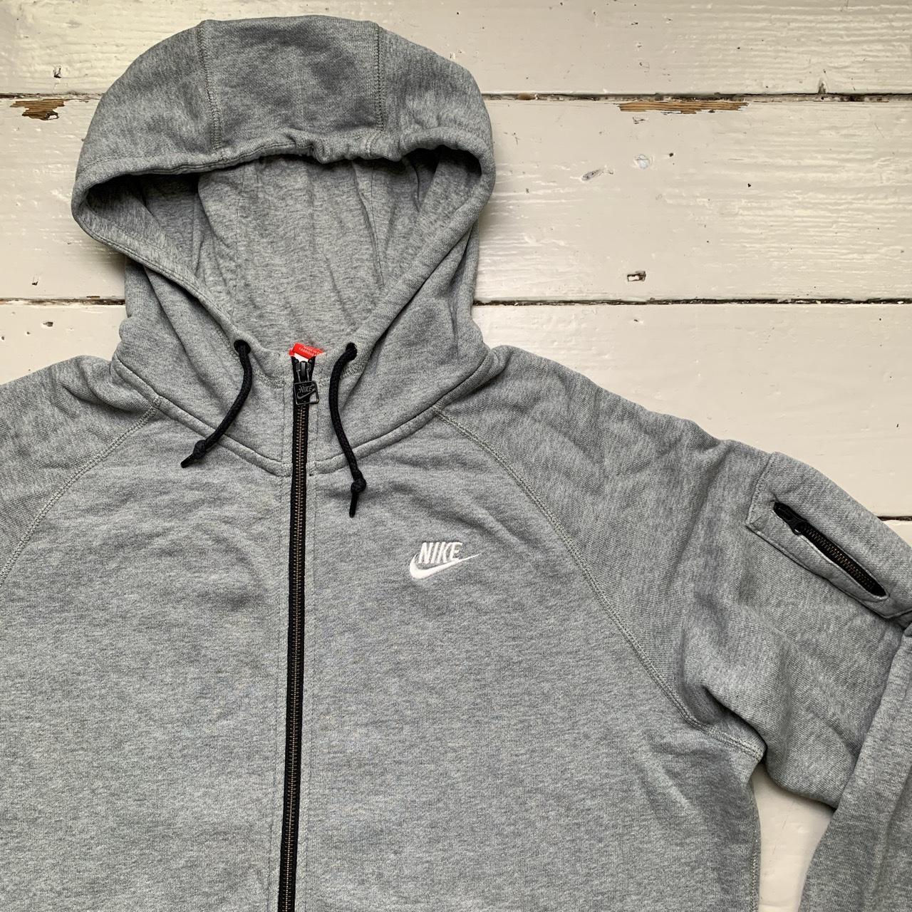 Nike aw77 hoodie discount with arm pocket