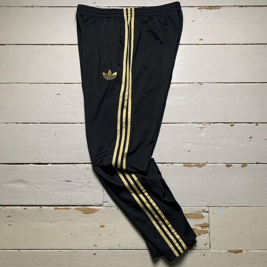 Adidas Vintage Black and Gold Trackpant Joggers