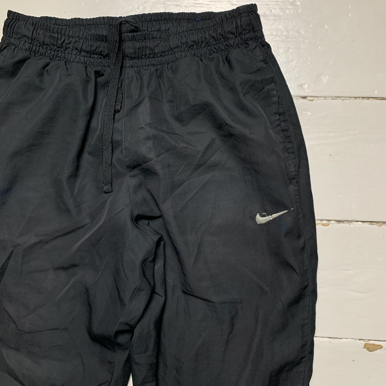 Nike Swoosh Baggy Black and White Shell Bottoms