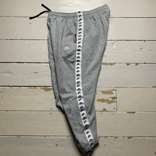 Nike Swoosh Repeat Logo Grey and White Joggers