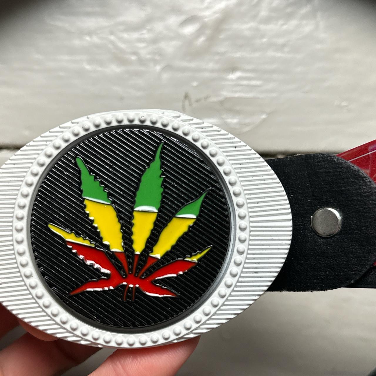 Spinning Marijuana Emblem Rasta Black Red Yellow and Green Belt
