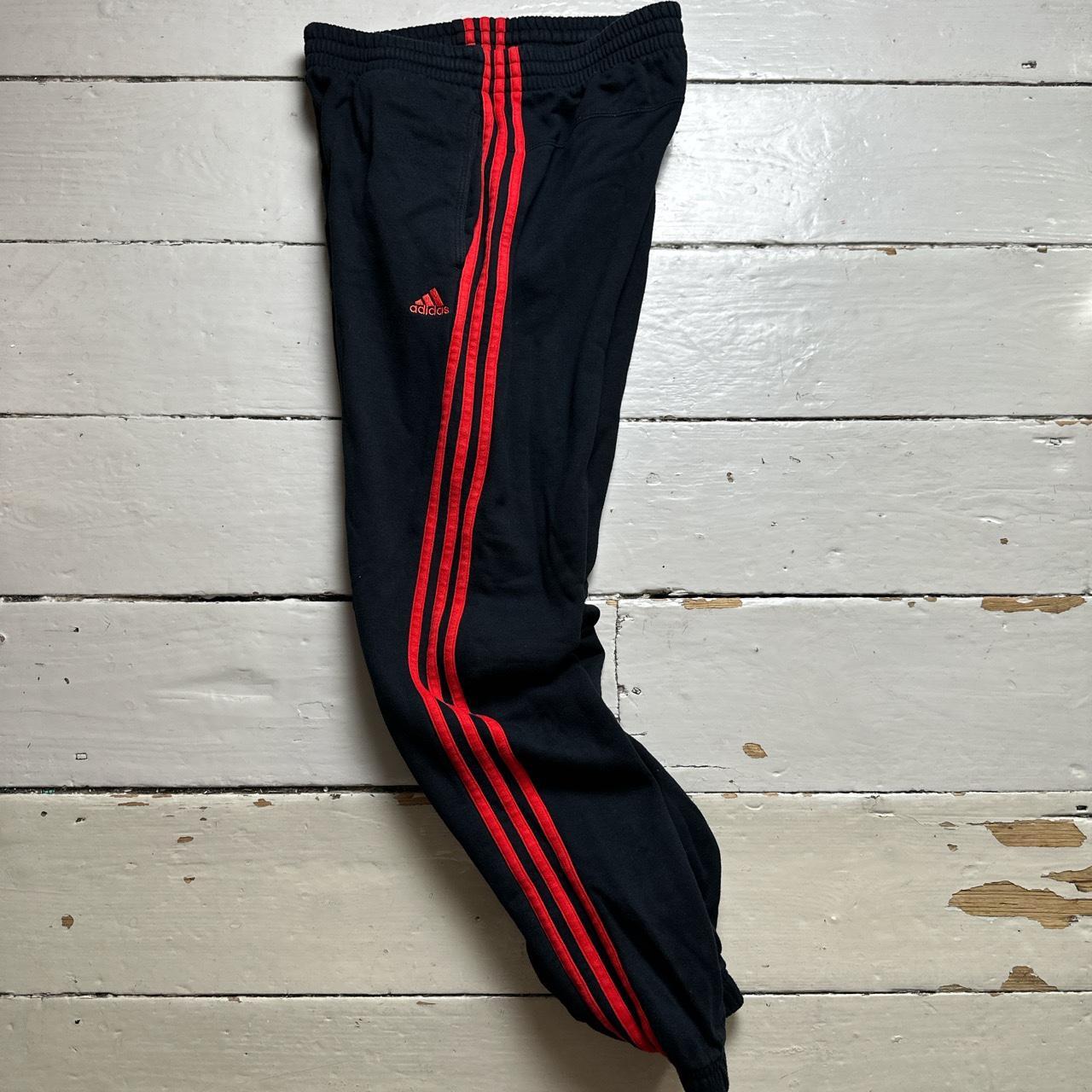 Black adidas joggers with best sale red stripes