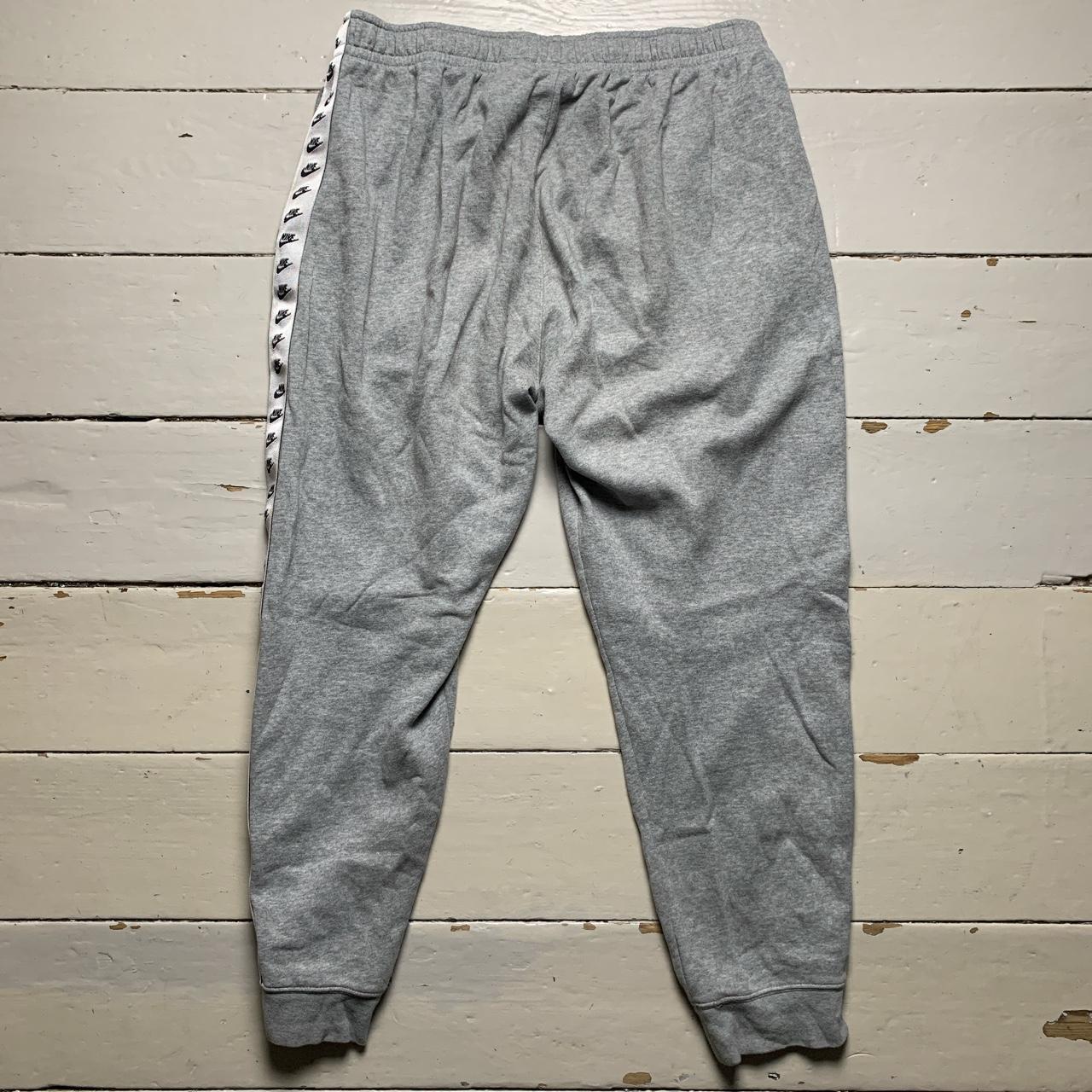 Nike Swoosh Repeat Logo Grey and White Joggers