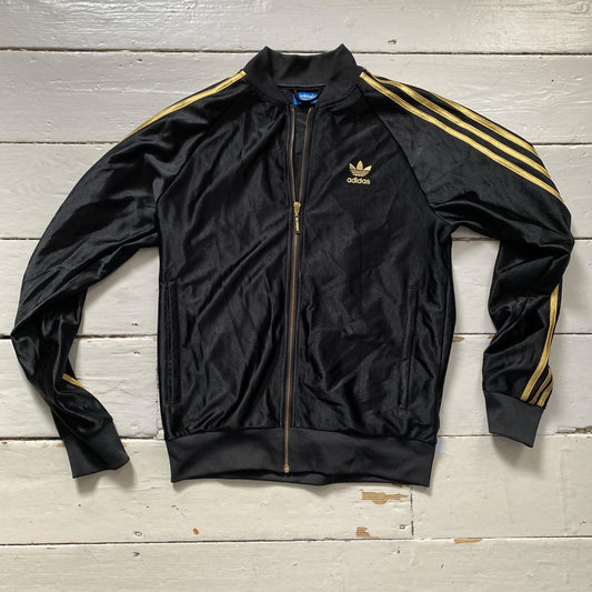 Adidas Black and Gold Top (Medium)