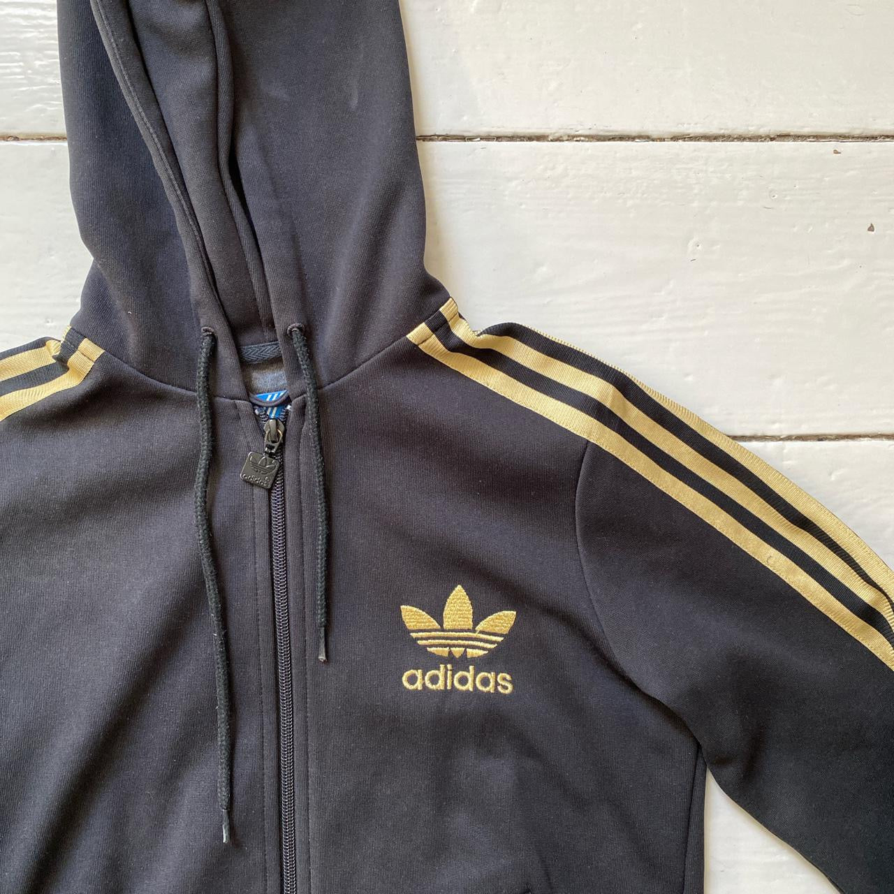 Adidas Black and Gold Hoodie (Size 8)