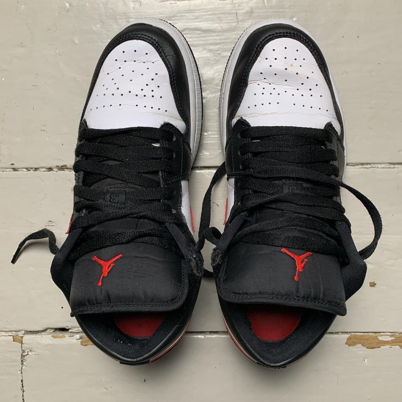 Jordan 1 Low Black Siren Red (UK 7)