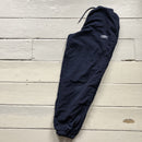 Umbro navy shell bottoms size S
