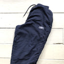 Umbro navy shell bottoms size S