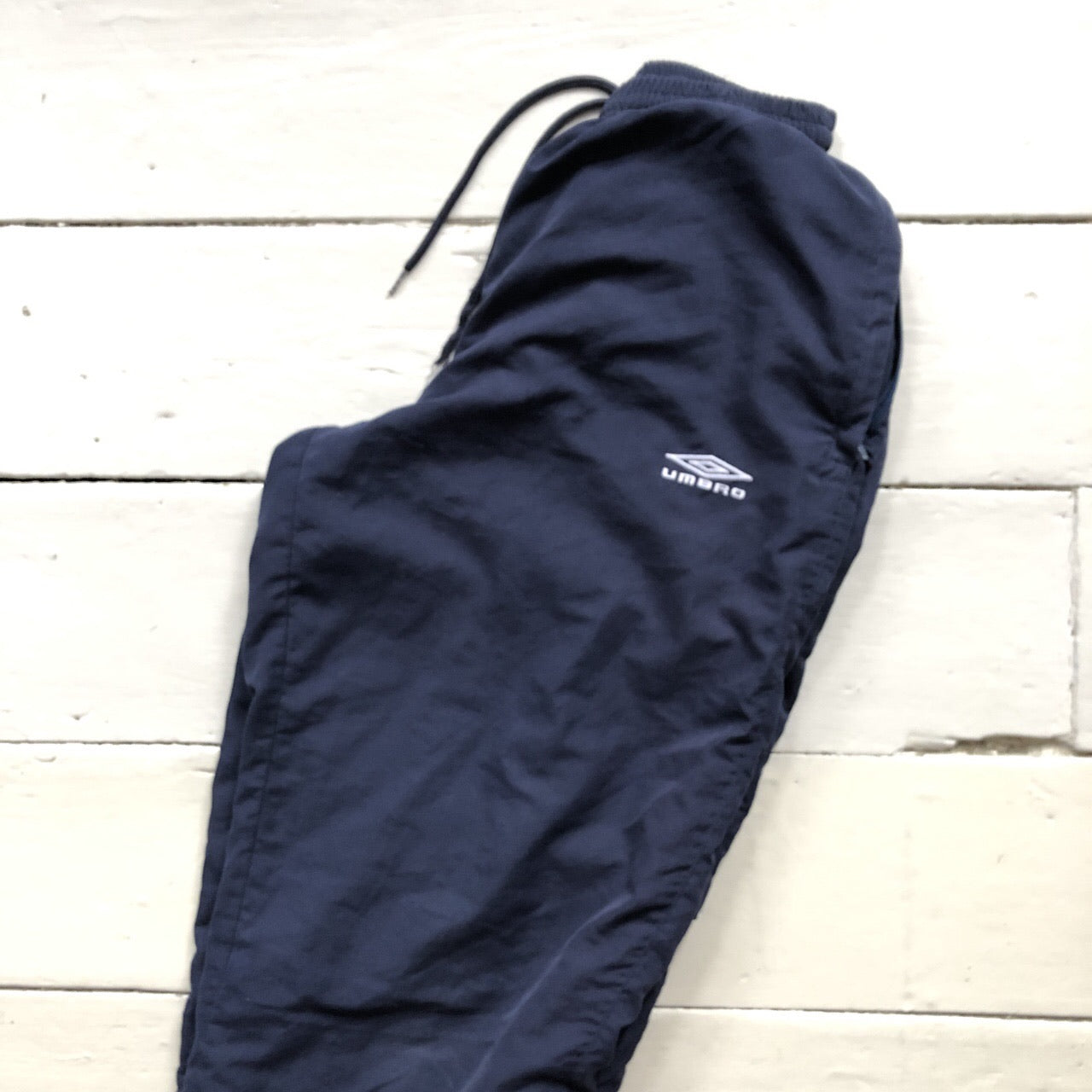 Umbro navy shell bottoms size S