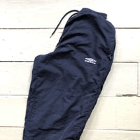 Umbro navy shell bottoms size S