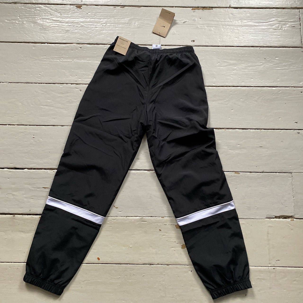 Nike Swoosh Shell Bottoms (Women Small)