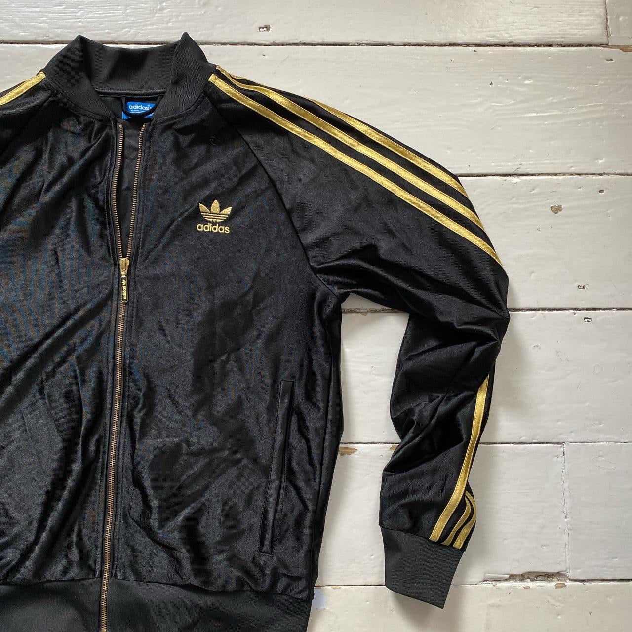 Adidas Black and Gold Top (Medium)