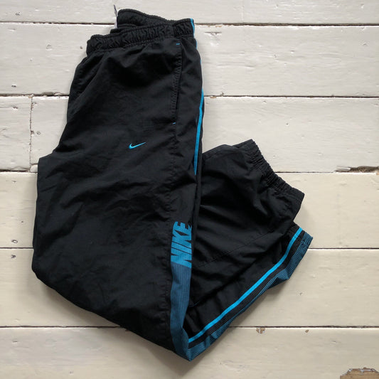 Nike Club Spellout Shell Bottoms (Large)