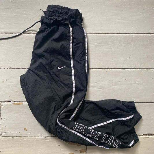 Nike Swoosh Spellout Shell Bottoms (Small)