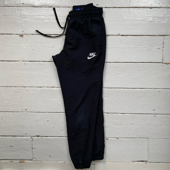 Nike White Swoosh Shell Bottoms (Small)
